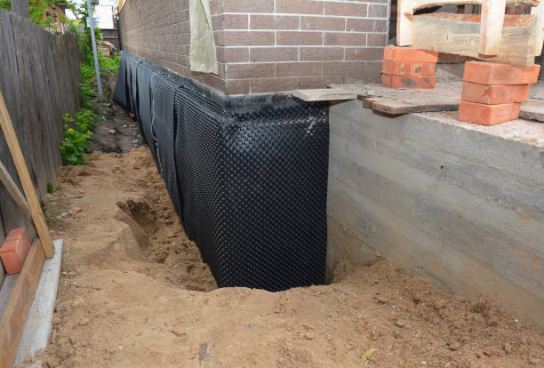 Happy homeowners after waterproofing job in Newtown